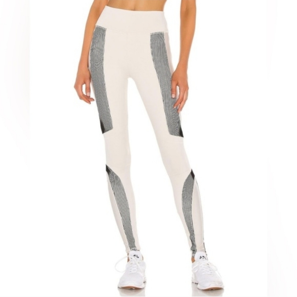 Alo Yoga Electric Leggings Bone white color with black detailing